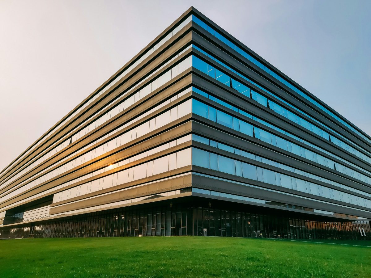 A large building with many windows on the outside.